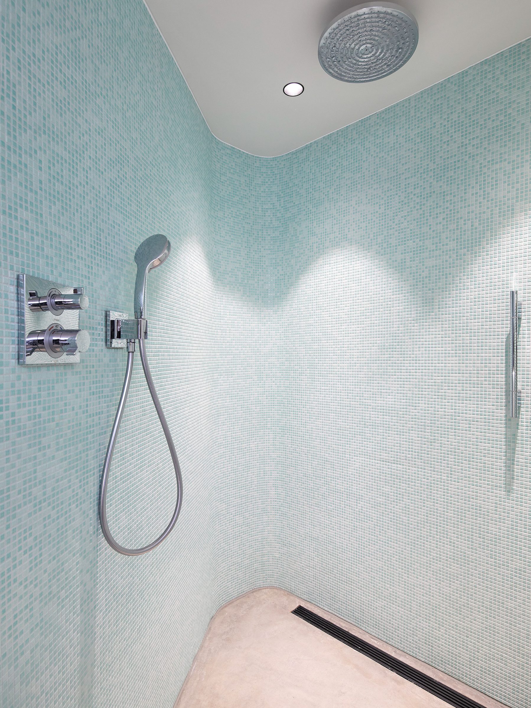 Curved tiled shower wall in house | cdc studio cambridge architects