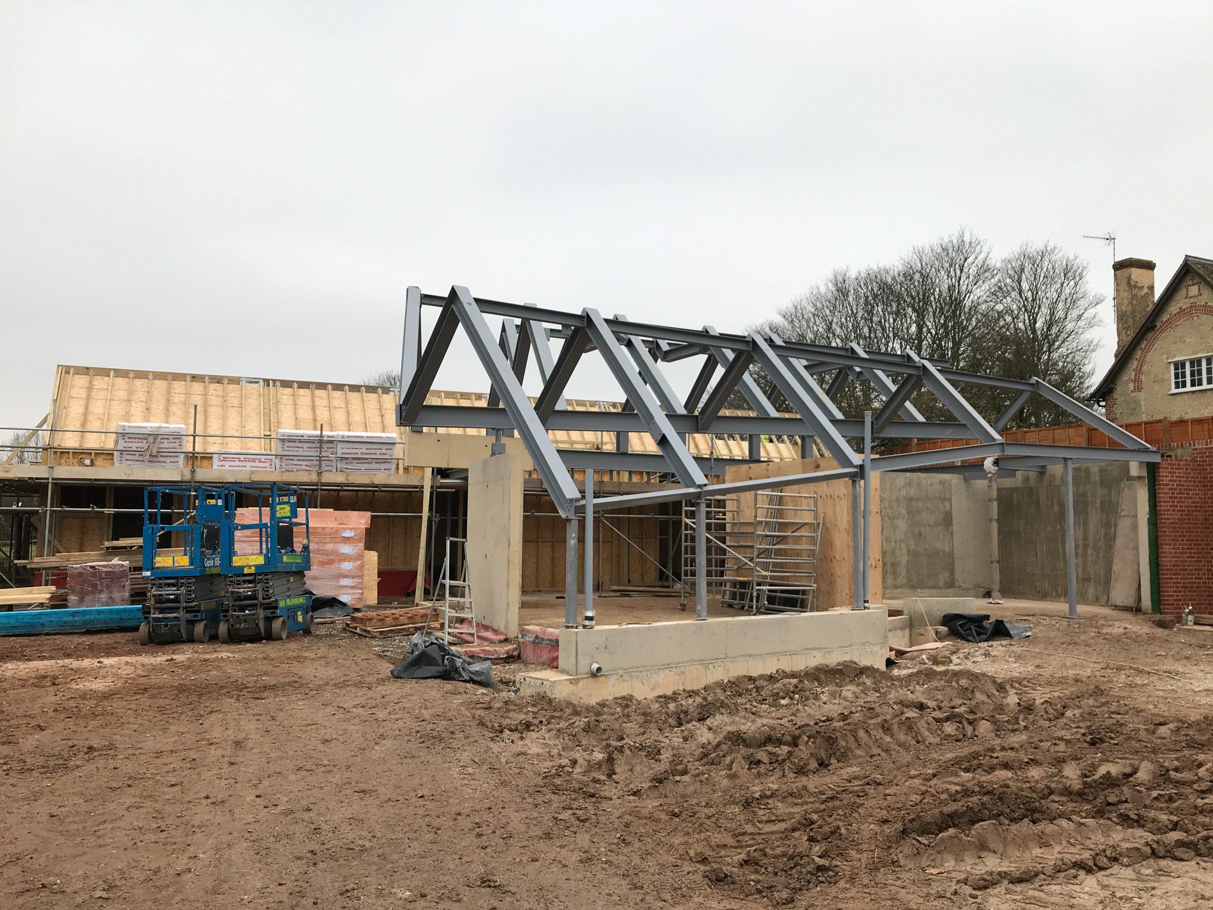 Construction of steel frame of pitched roofs | cdc studio cambridge architects