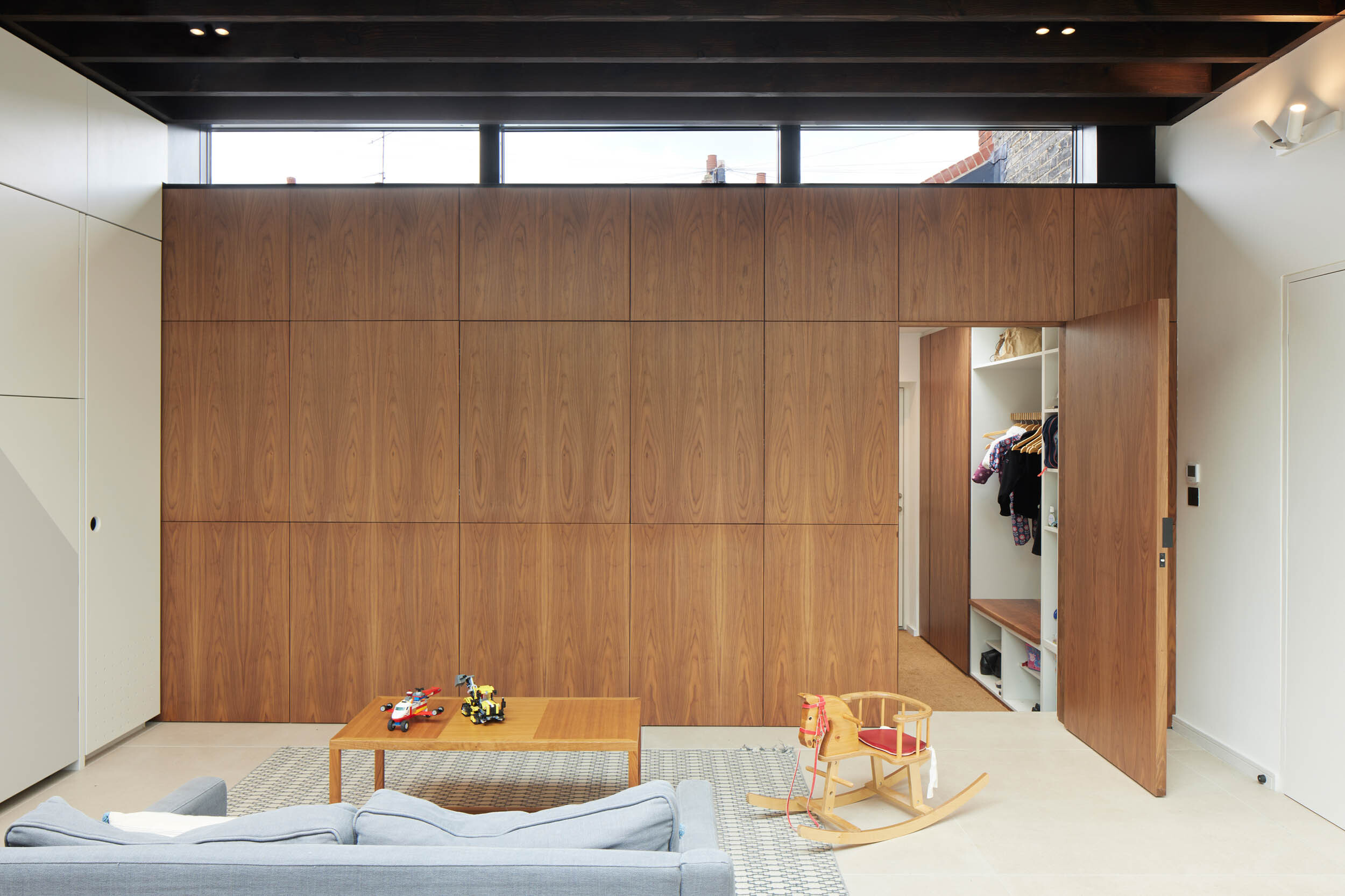 concealed tv behind walnut veneered panels 4 | cdc studio cambridge architects