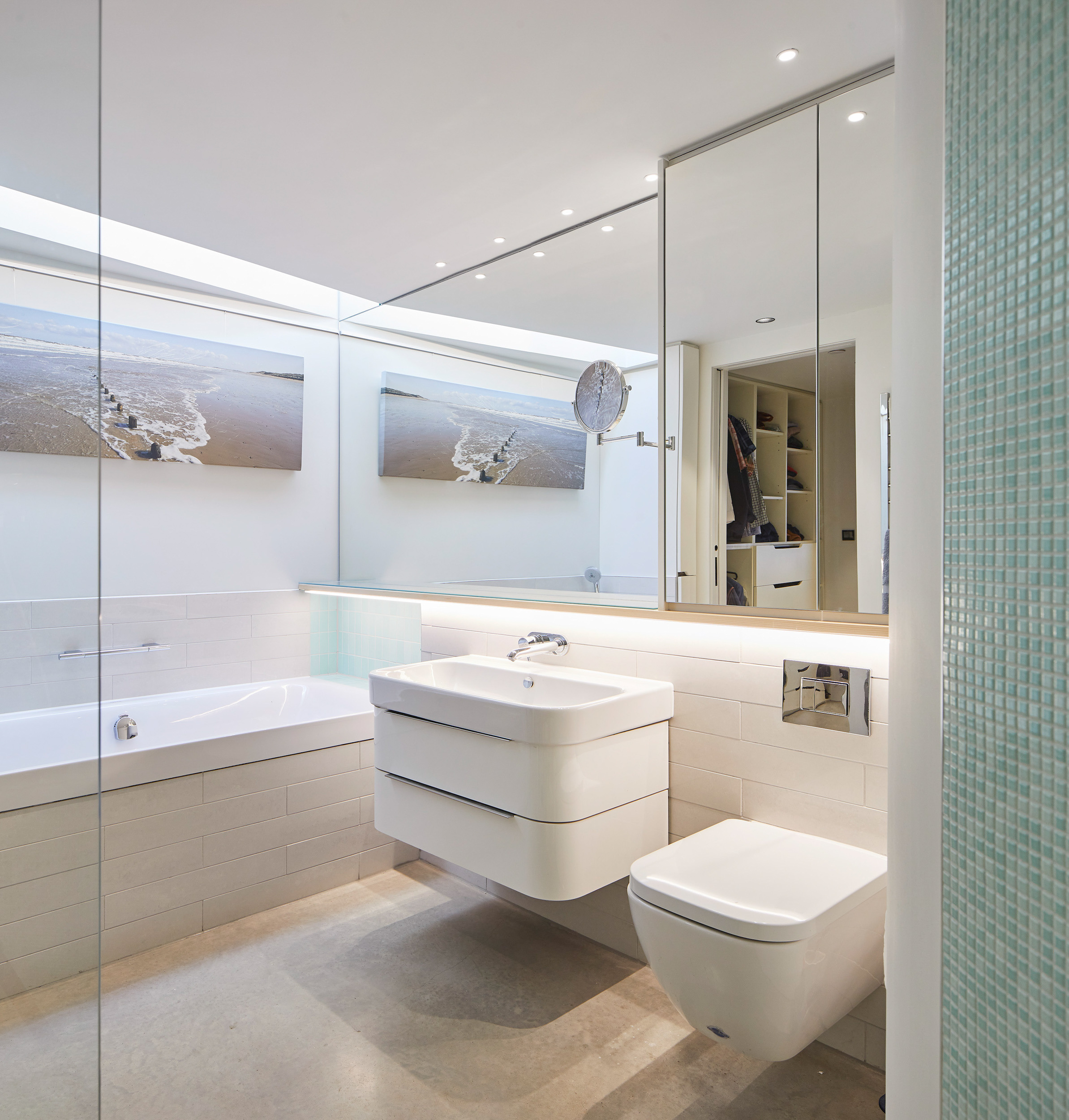 white bathroom with mirror, toilet and sink | cdc studio cambridge architects