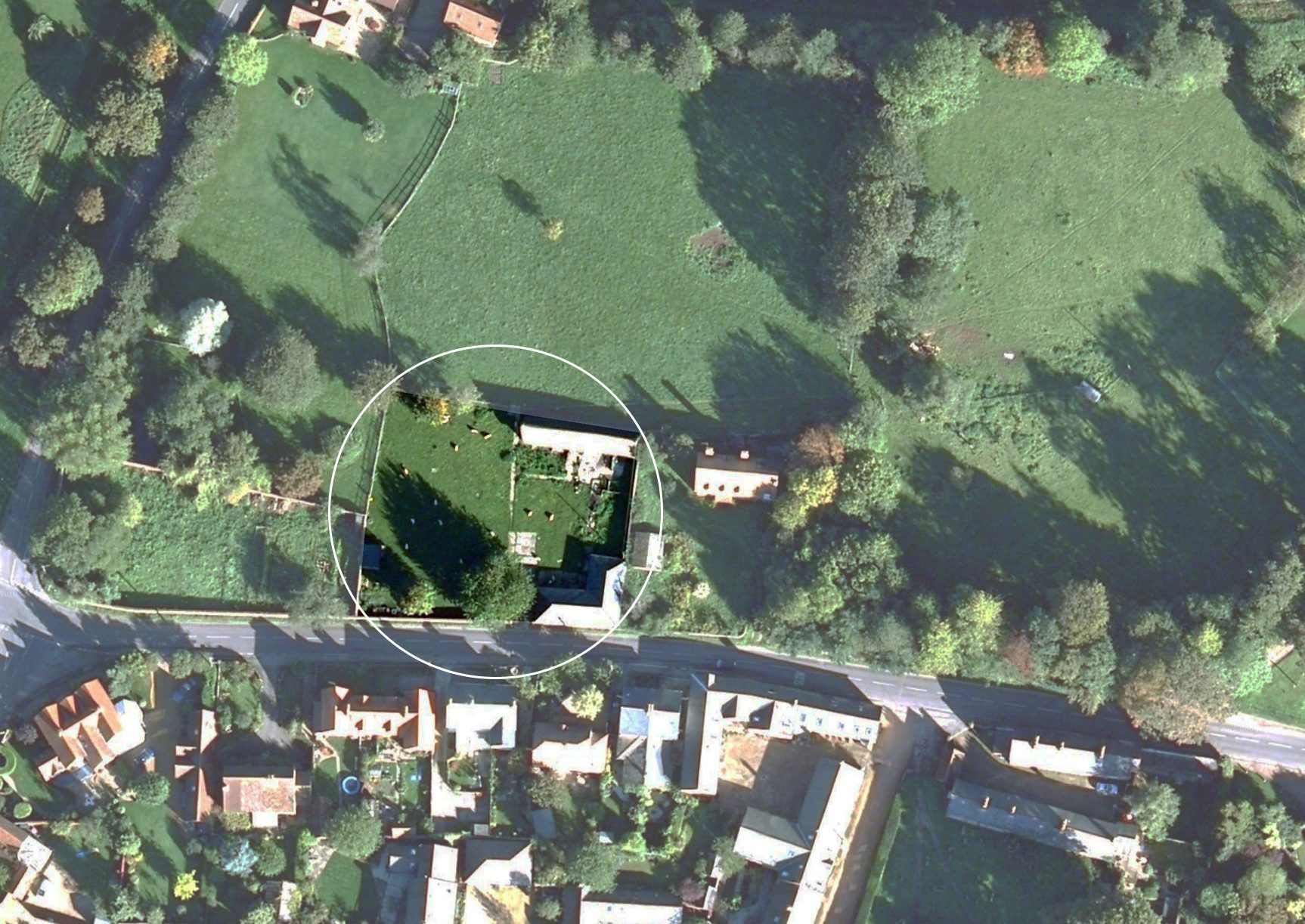 Aerial view of Cambridgeshire landscape highlighting barn | cdc studio cambridge architects
